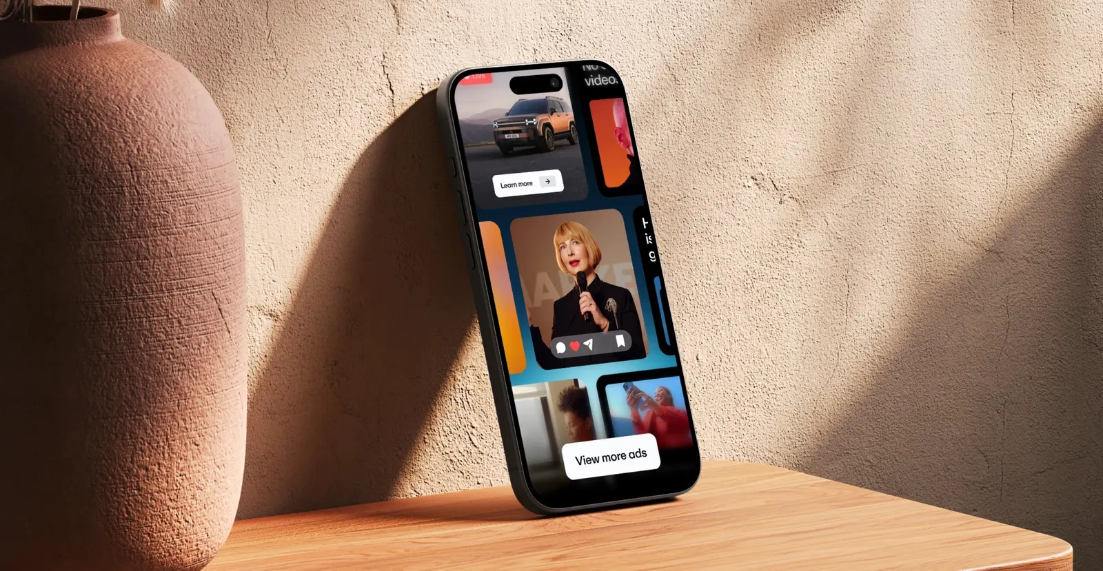 Social media ad creatives displayed on multiple smartphone screens