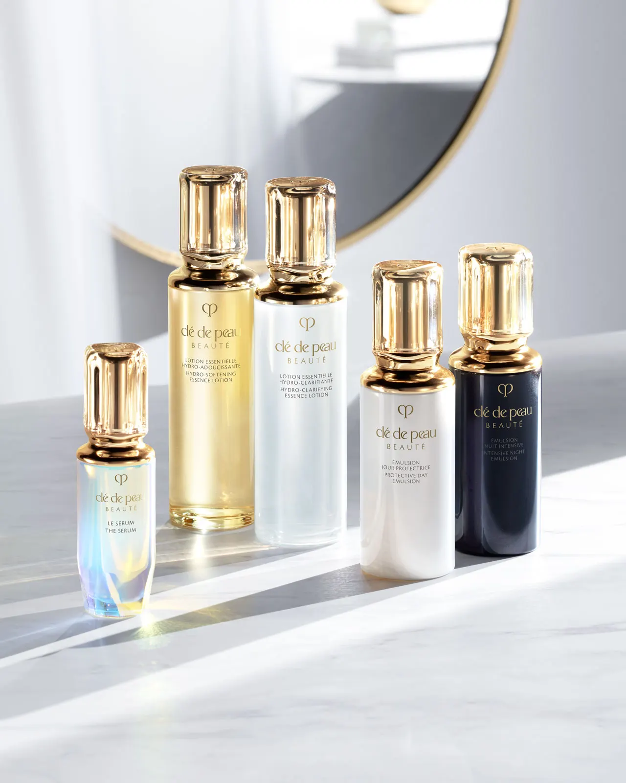 Skincare serum bottle photographed with botanical ingredients and natural props